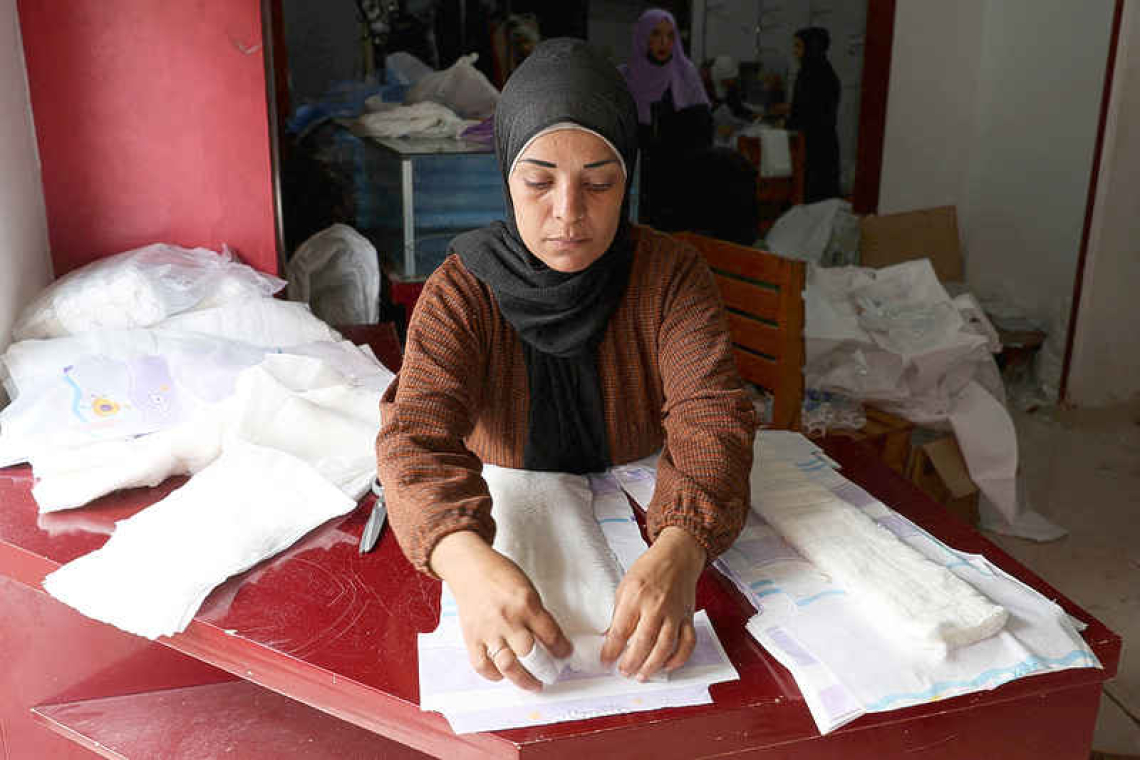 Diapers instead of bridal gowns: Gaza tailors adapt to wartime needs 