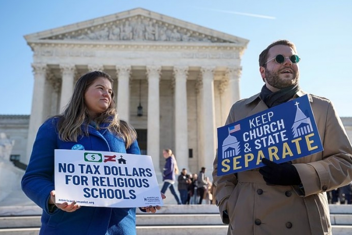 Roberts pivotal as US Supreme Court tackles public aid to religious schools