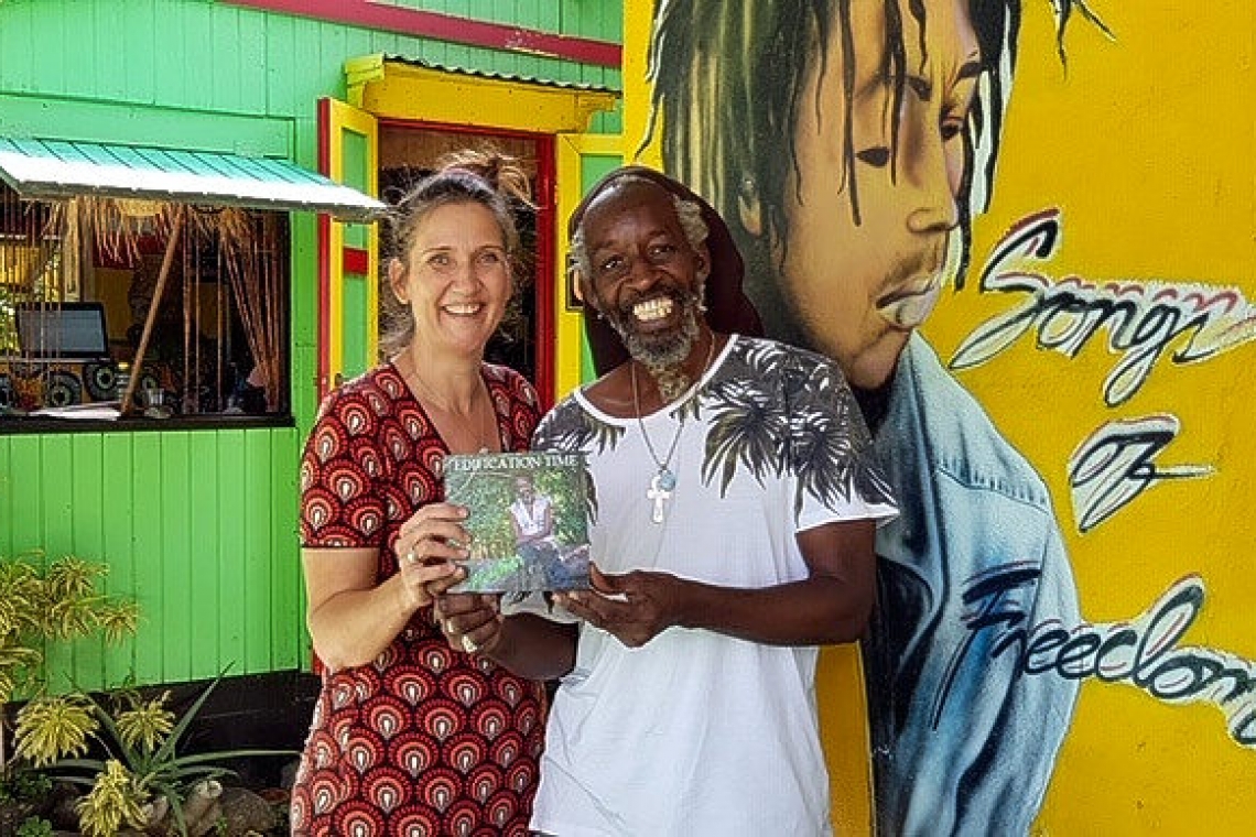       Ras Bushman presents his very first  book at Get Up, Stand Up Festival   