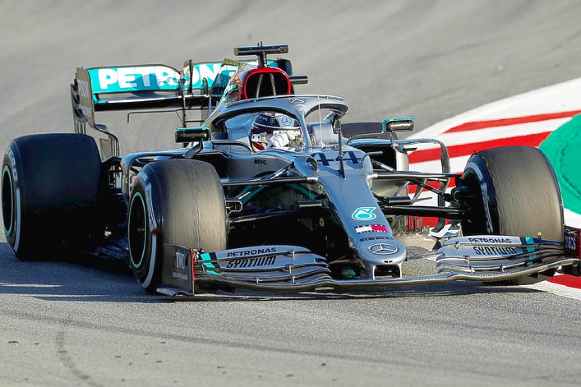 Hamilton top in testing as Vettel calls off sick