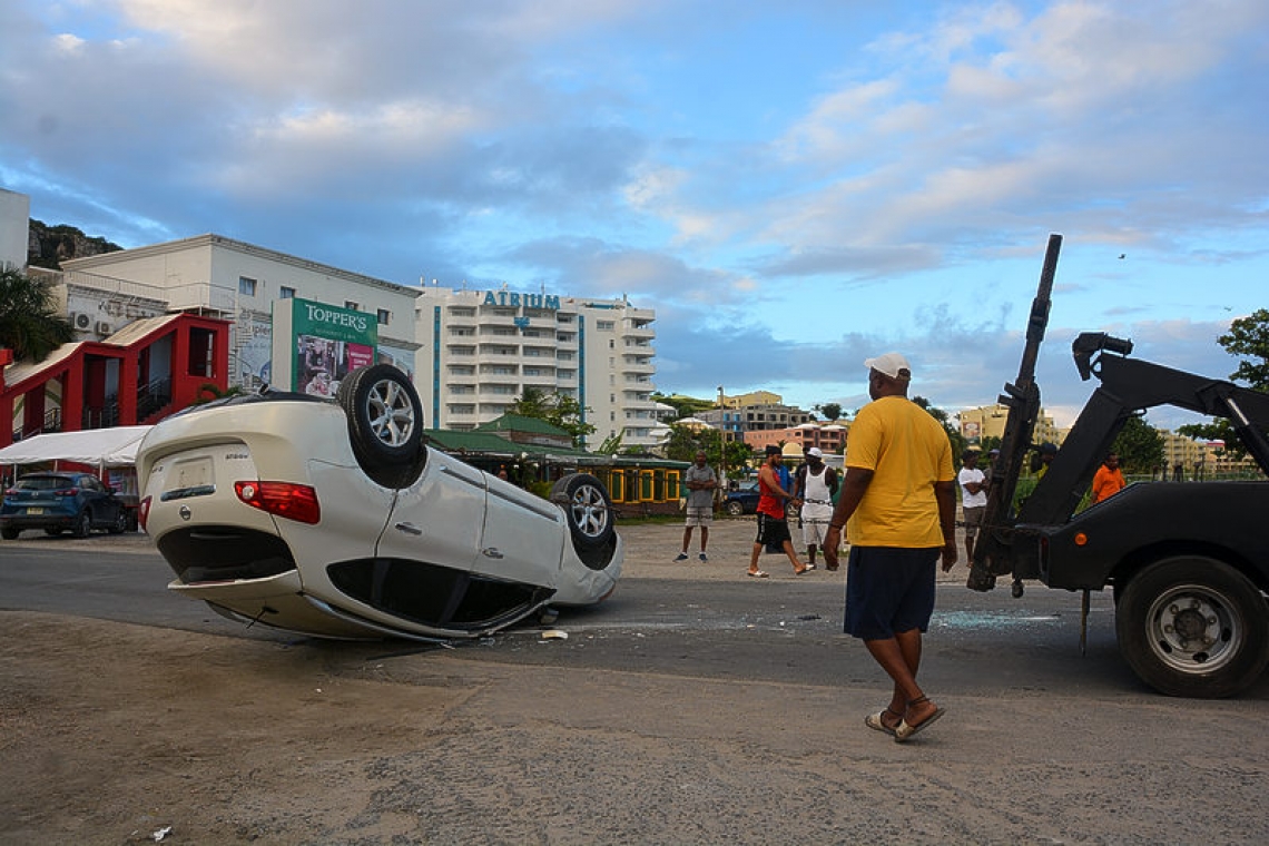       Accident causes  car to flip over   