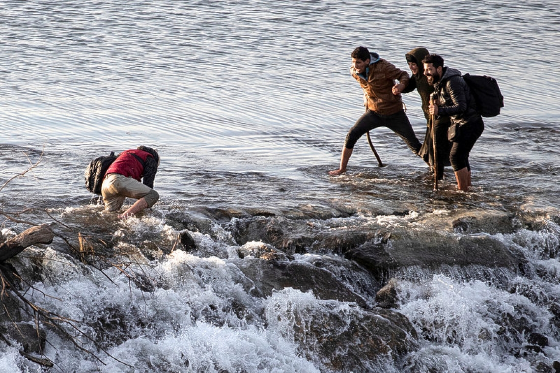 Migrants clash with Greek police at border after Turkey opens floodgates