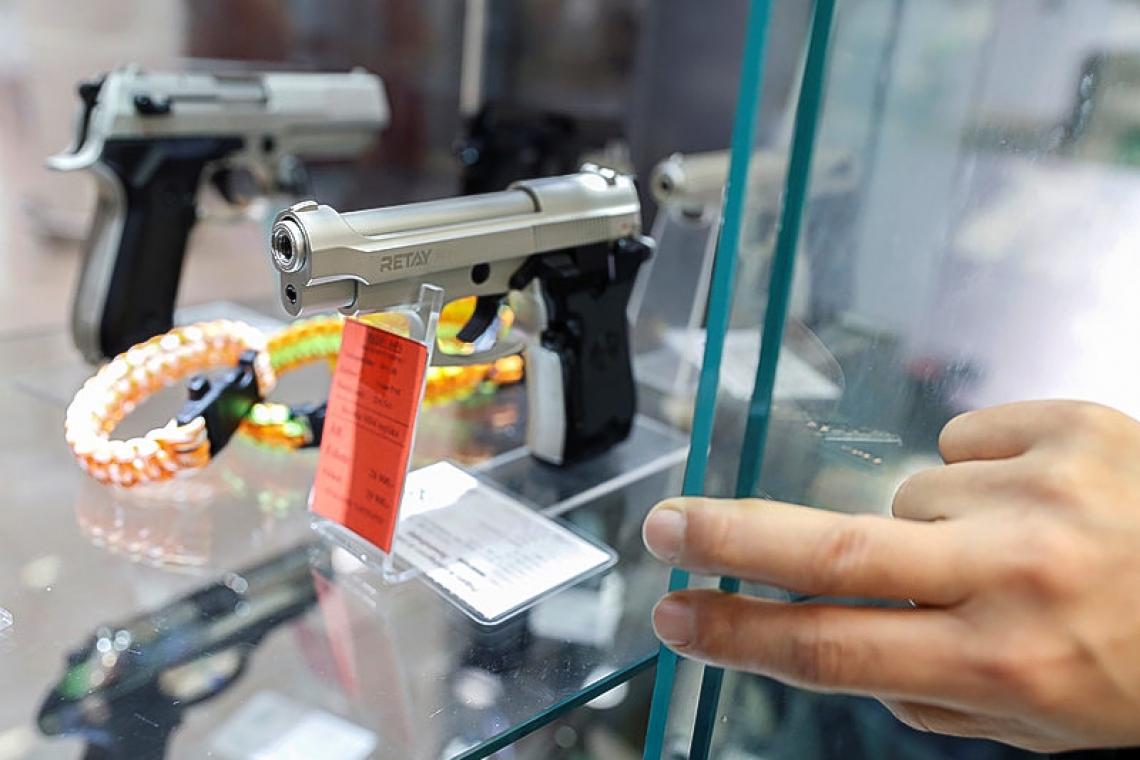 Hungarians queue for guns for fear  of disorder as coronavirus spreads