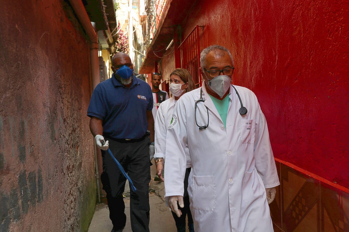 Mistrustful of state, Brazil slum hires own doctors to fight virus