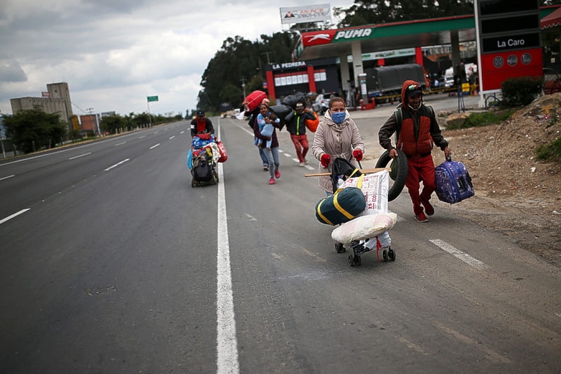 Venezuelan migrants flee Colombian quarantine for their shattered homeland