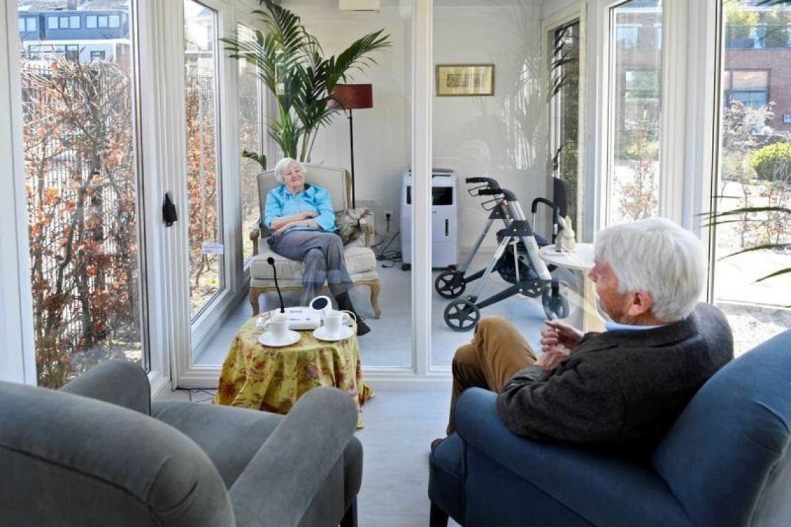 Dutch elderly home builds glass  cabin for safe coronavirus visits