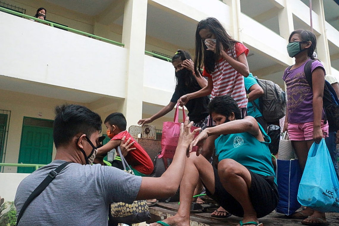 Pandemic hampers Philippines mass evacuation as typhoon hits