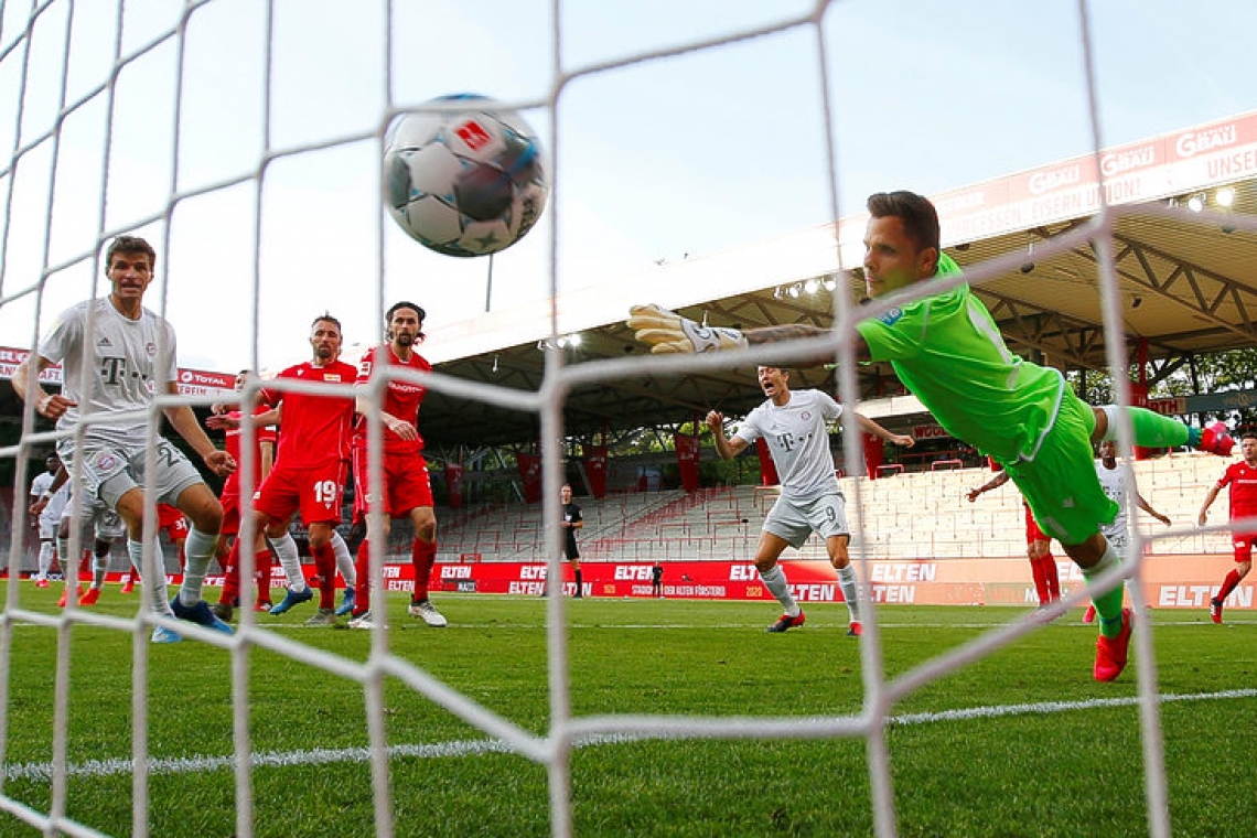 Bayern ease past Union 2-0 in league restart to stay top