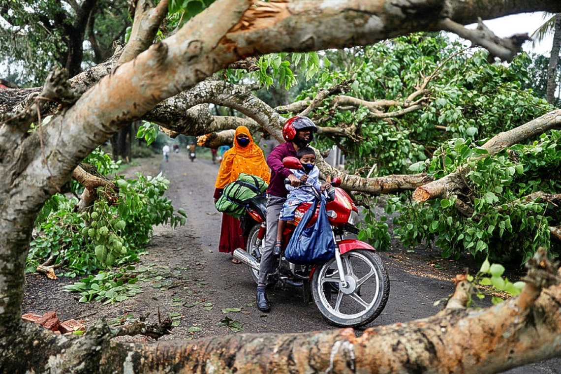 Cyclone kills at least 82 in India and Bangladesh, flooding lowlands