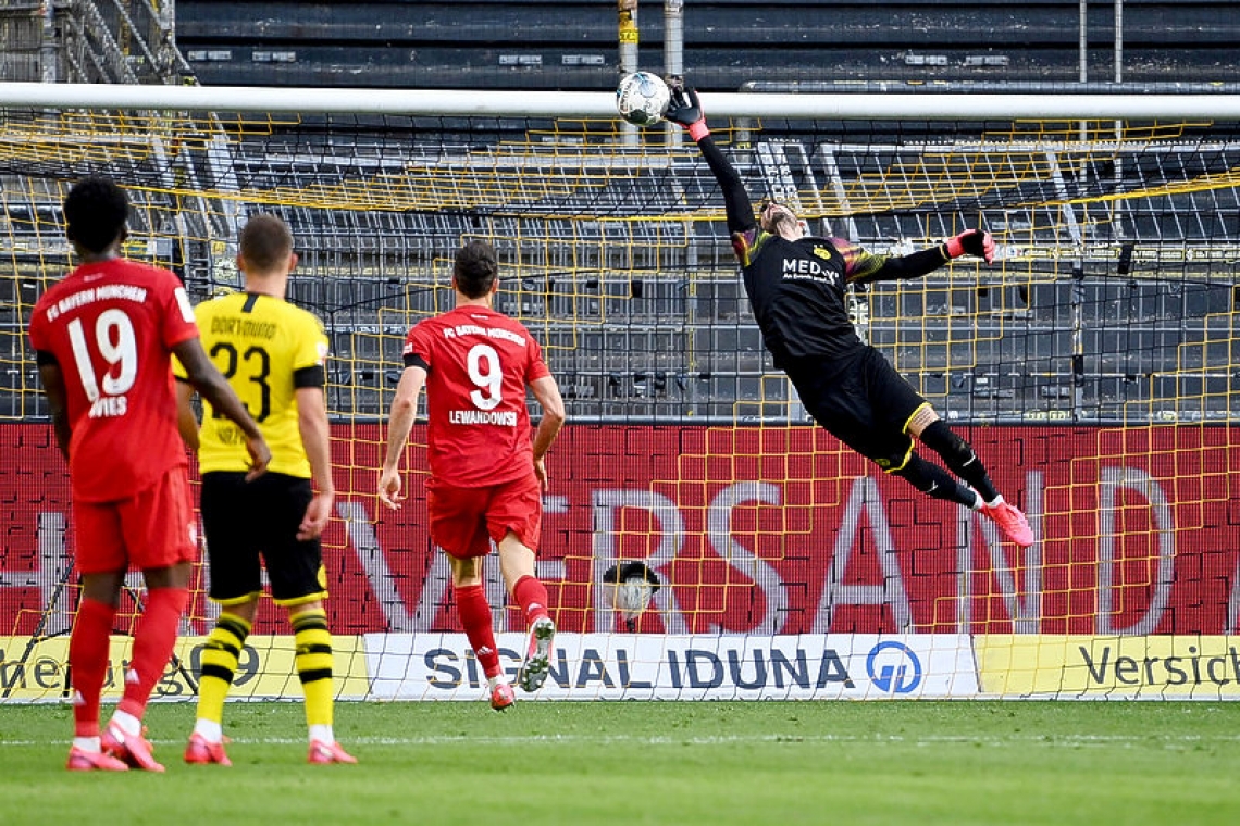 Bayern with one hand on league  title after 1-0 win at Dortmund