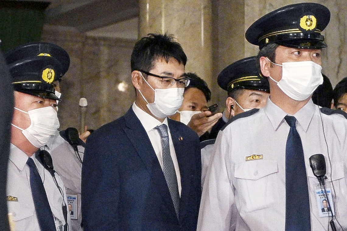 Ex-Japanese minister, lawmaker wife arrested for suspected vote-buying