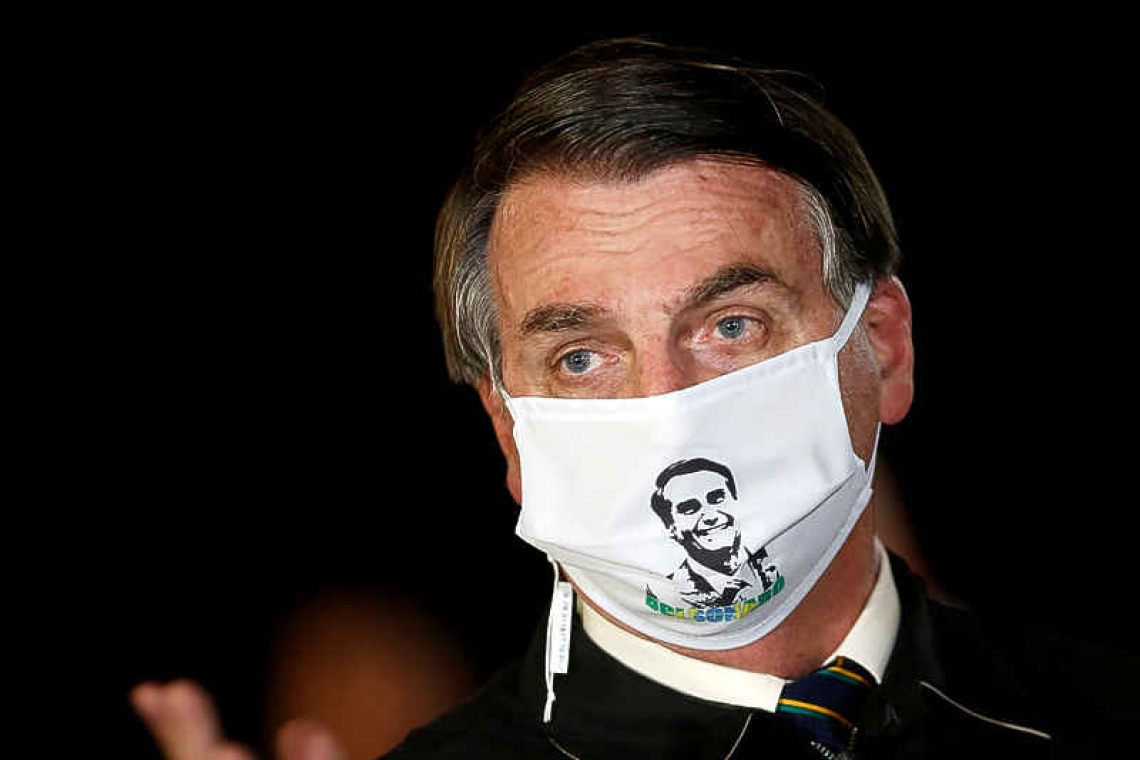 Bolsonaro catches coronavirus, shrugs off health risks