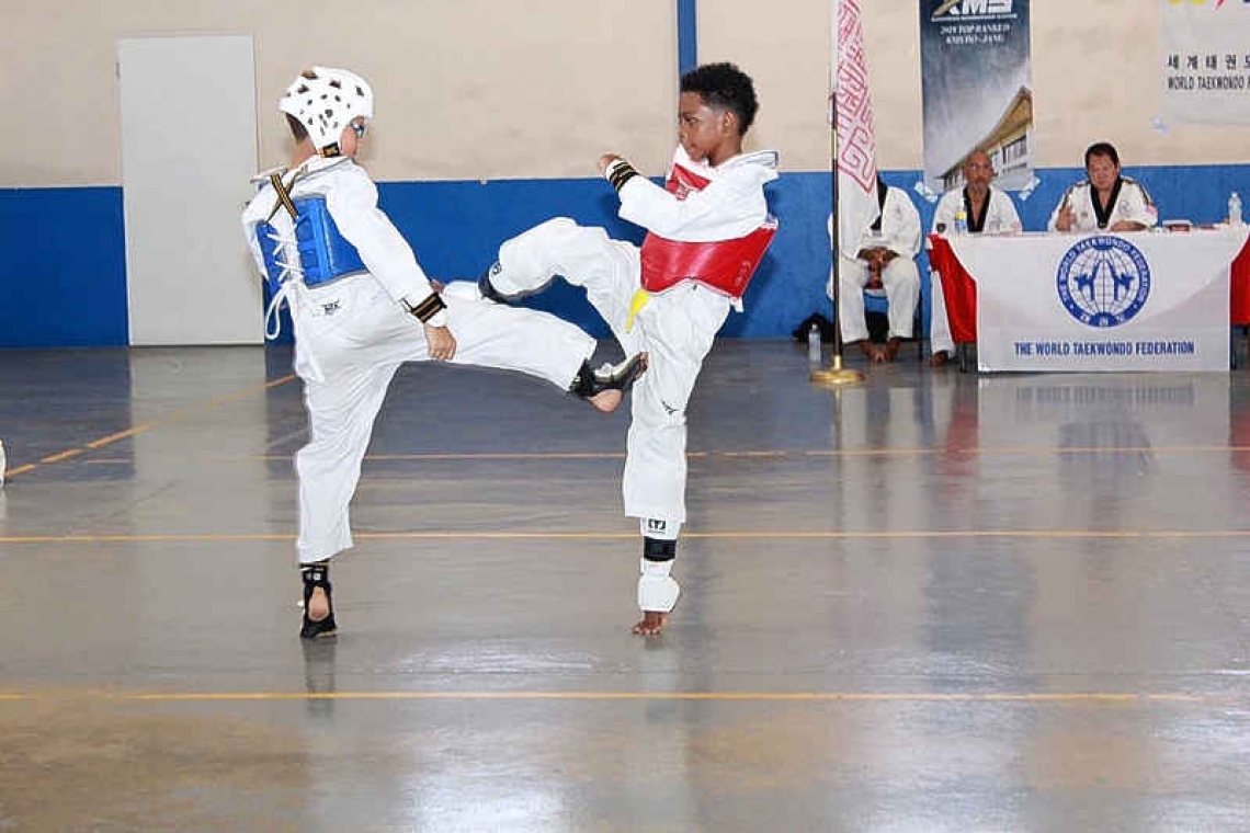 Taekwondo students pass virus delayed Belt exams