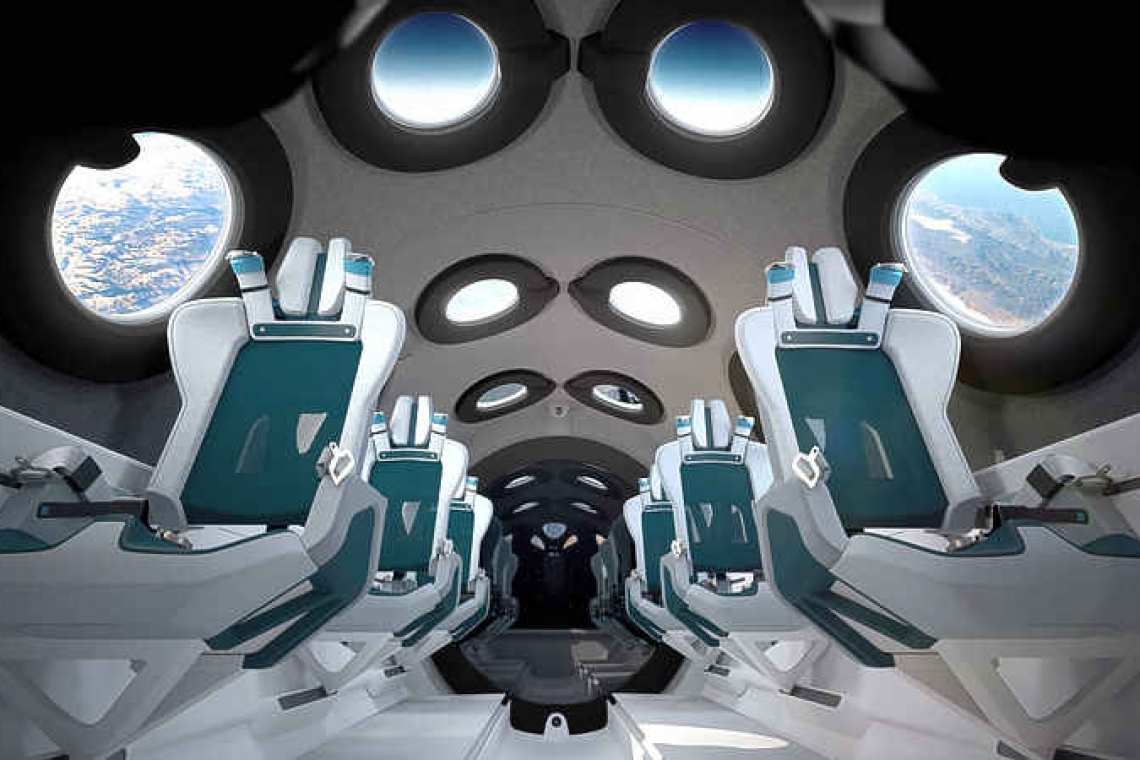Virgin Galactic unveils space plane's cabin, poised for commercial flights