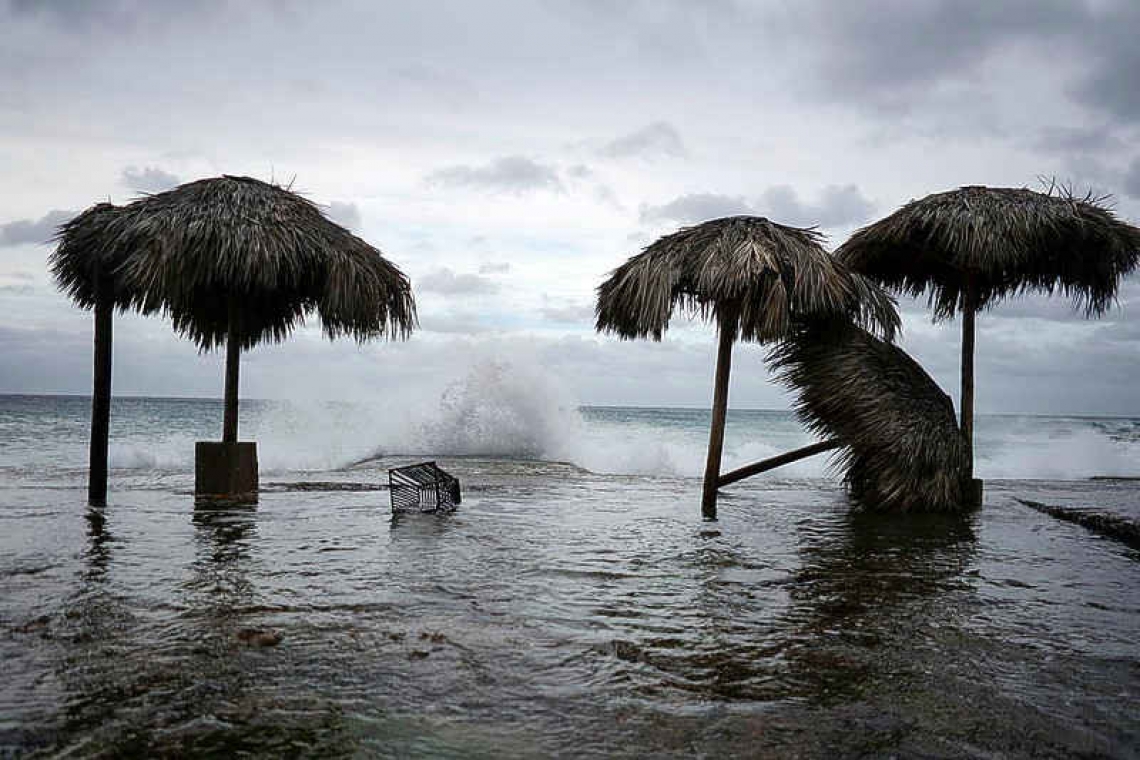 Hurricane Laura slams into Louisiana, forecasters warn of wall of water