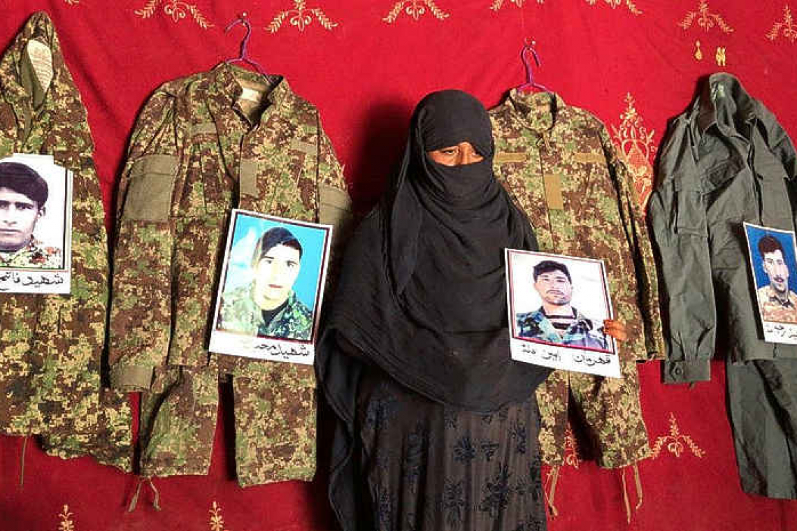Afghan woman prays that peace will save her fourth husband
