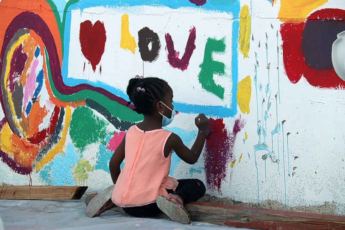       Middle Region park wall  brightened with murals