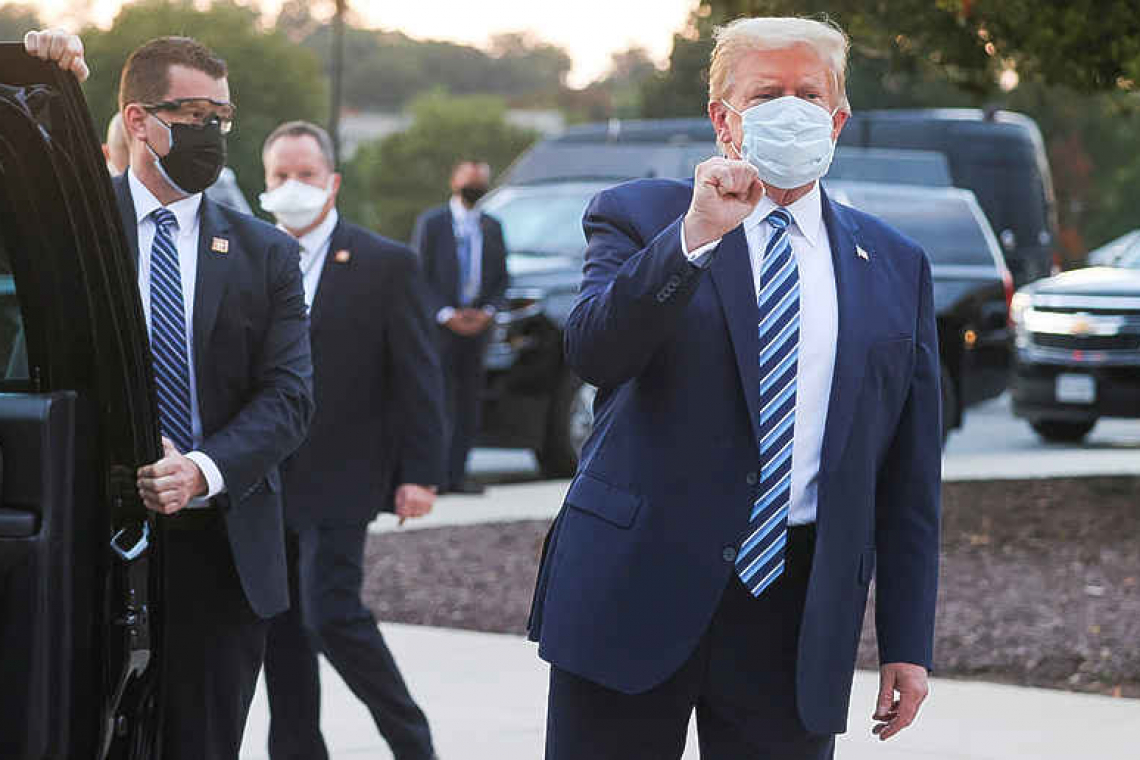 Trump returns to White House hard hit by coronavirus infections