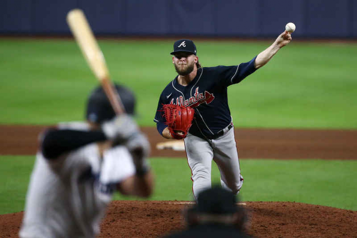  Braves toss another shutout, 7-0  eliminate Marlins from postseason