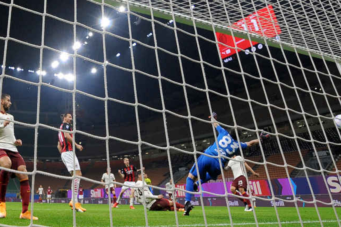 AS Roma hit back three times to hold leaders Milan