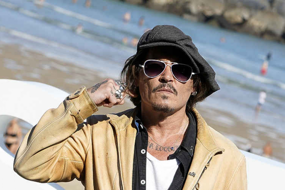 Johnny Depp is a wife beater, UK judge rules in libel case