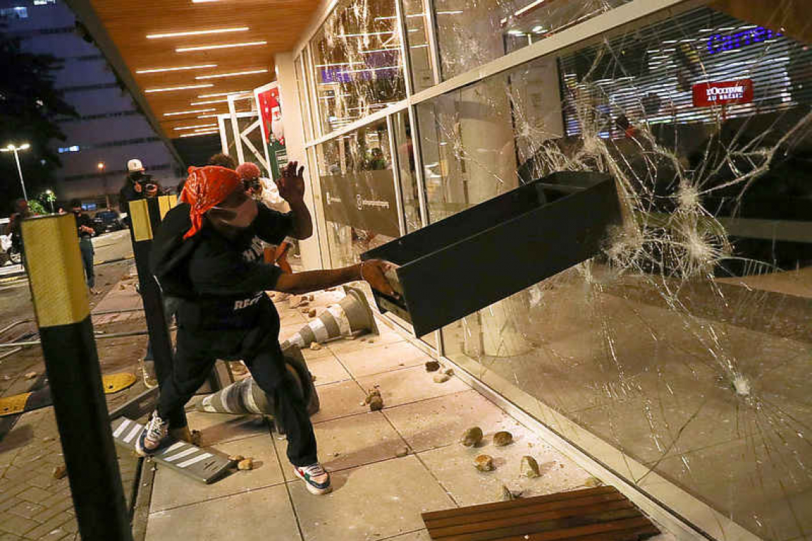 Violence erupts in Brazil after Black man beaten to death at supermarket