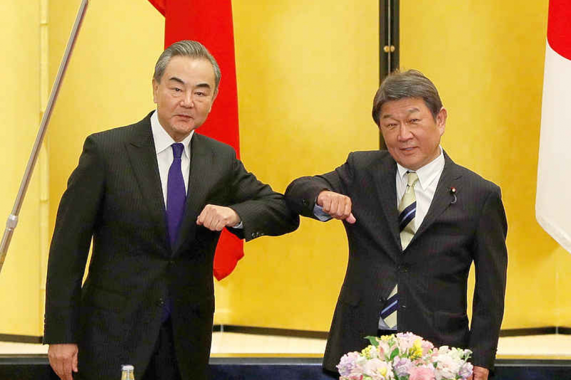 Japan and China to restart business travel, coordinate on East China Sea