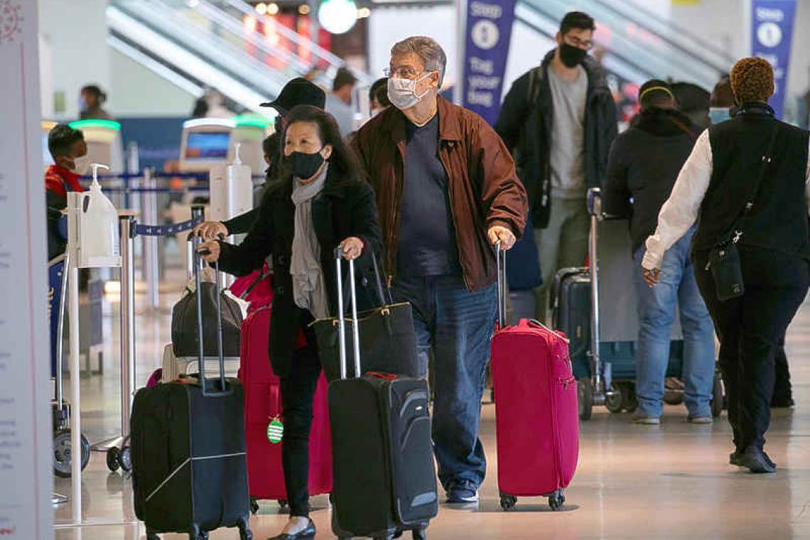 Americans defy pandemic, political leaders to travel for Thanksgiving