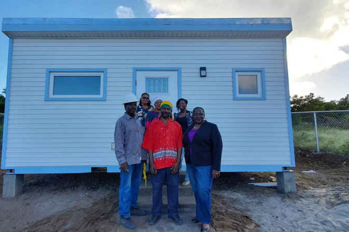 Keys to new home presented  to Statia resident Silvio Blair