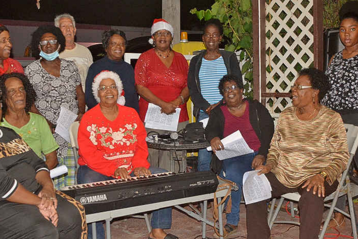 Golden Rock Carollers present  Christmas music all over Statia