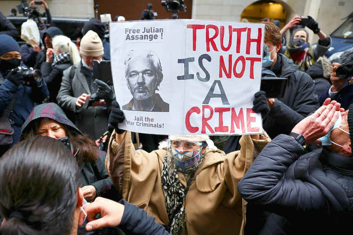 British judge rejects extraditing Assange to US over 'suicide risk'
