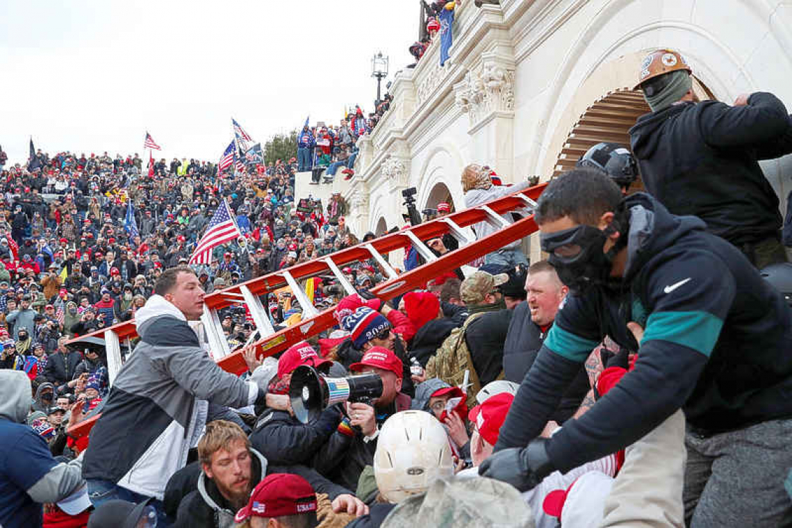 Congress debates certification of Biden's win after Trump supporters storm US Capitol