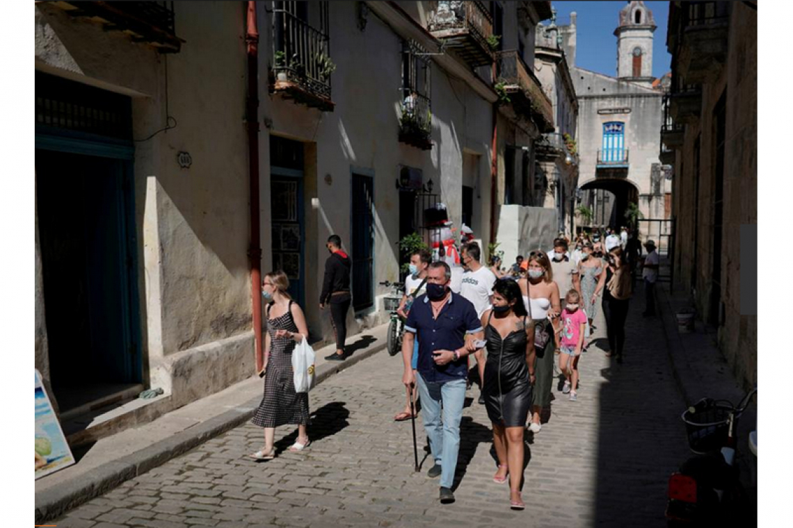    Cuba tightens COVID-19 measures  as visitors fuel record contagion