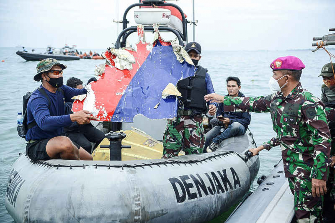 Indonesia hopes to retrieve black boxes of crashed jet from Java Sea
