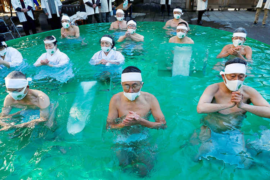 Japanese pray for end to pandemic in annual ice bath ritual at Tokyo shrine