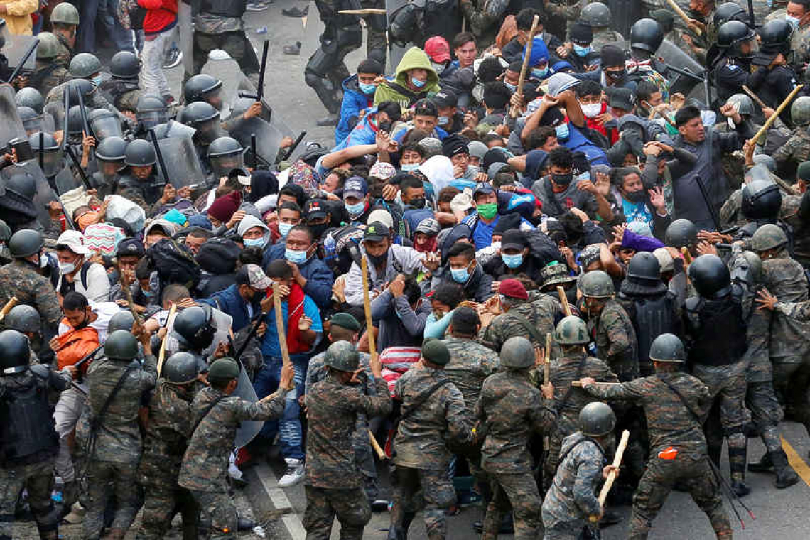 Guatemalan forces clash with migrant caravan