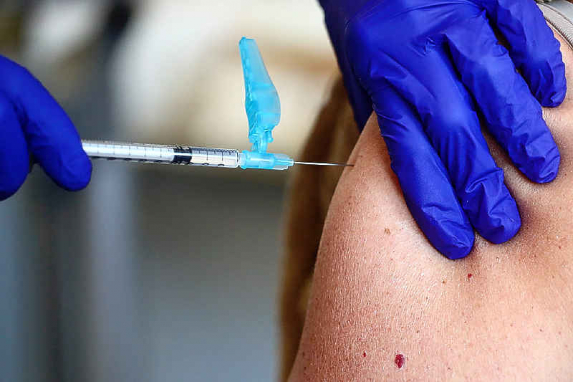 Europe's COVID shot party gives way to Pfizer vaccine delay headache