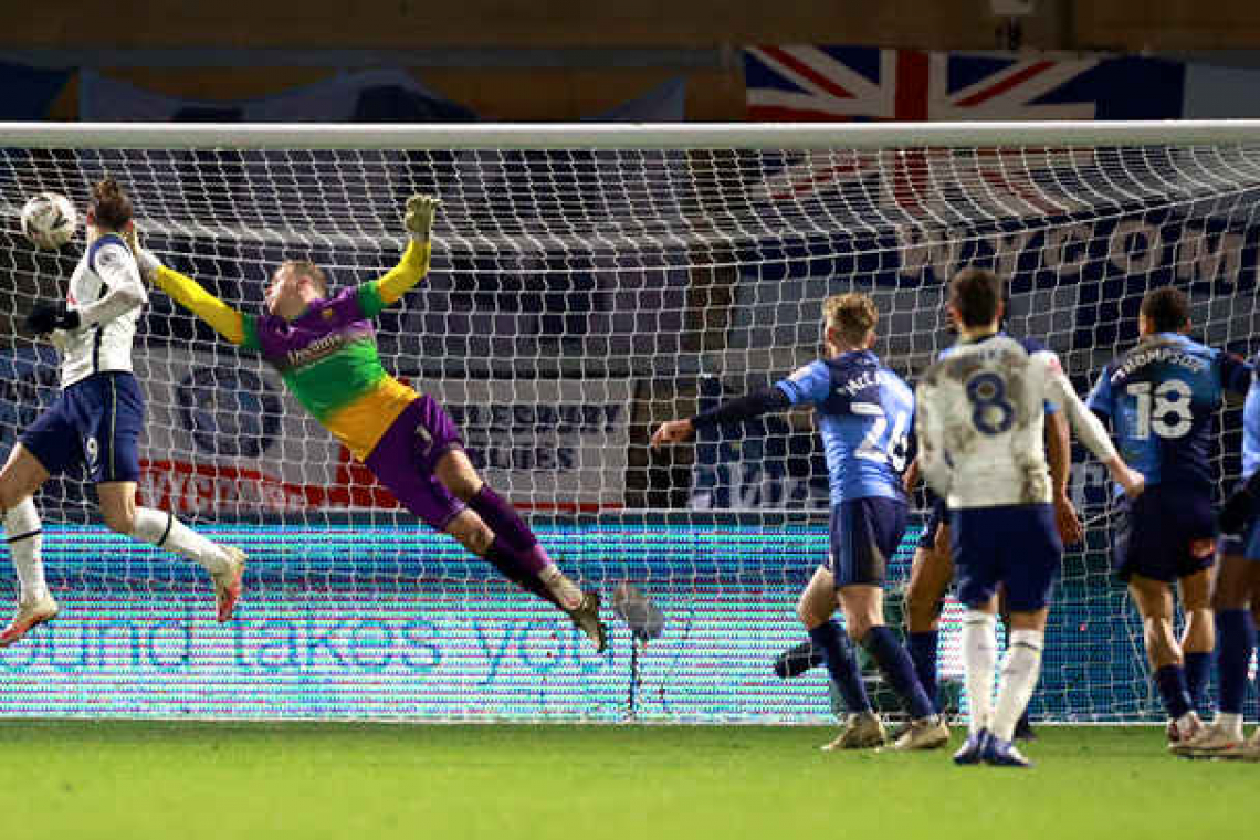 Late goal flurry earns Tottenham Cup win at Wycombe