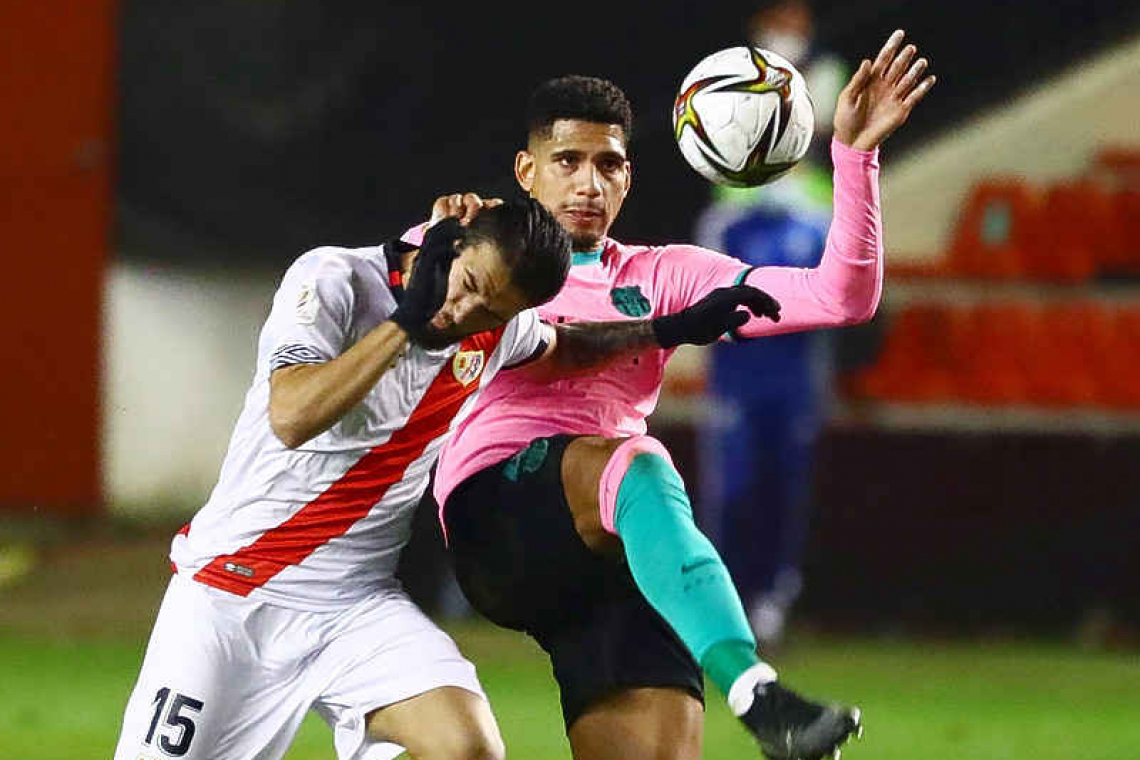 Messi leads Barcelona to Copa 2-1 comeback win over Rayo