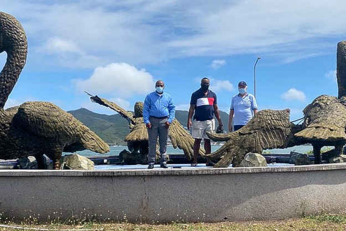 American couple sponsor repairs of  pelican statues at airport roundabout