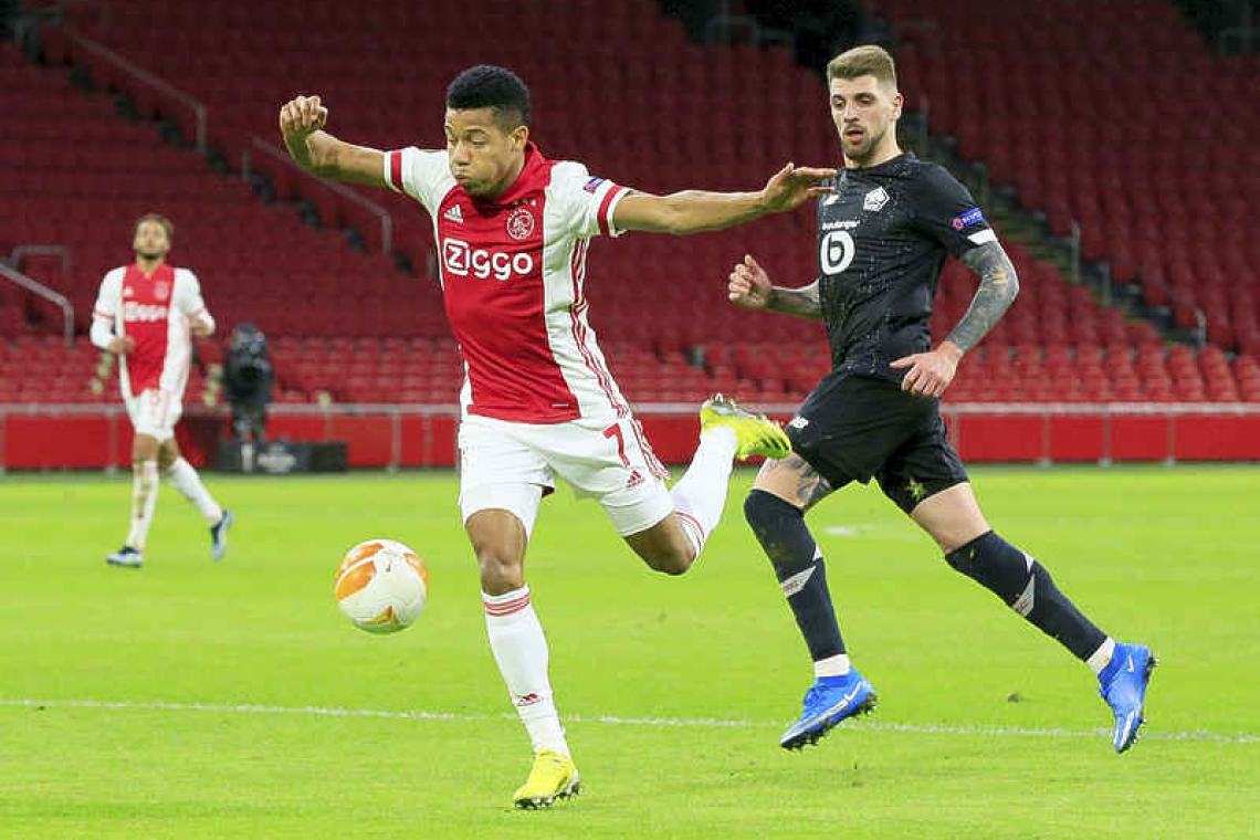 Ajax down Lille to progress to Europa League’s last 16