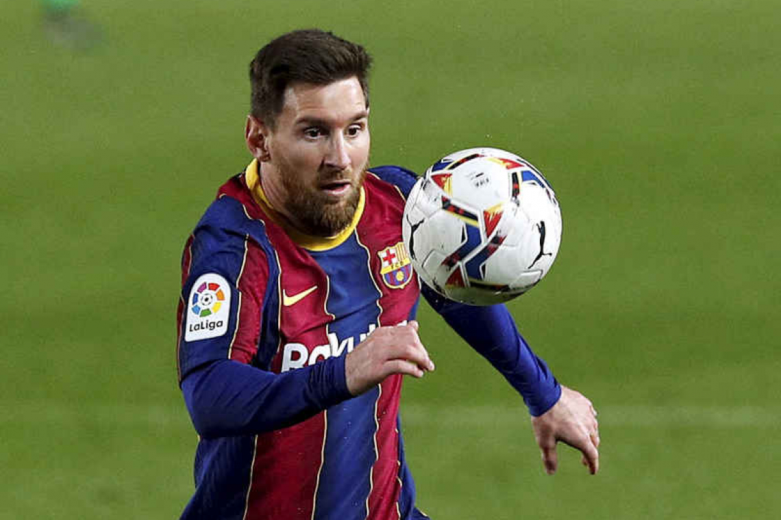    Messi leads Barcelona to within four points of La Liga summit