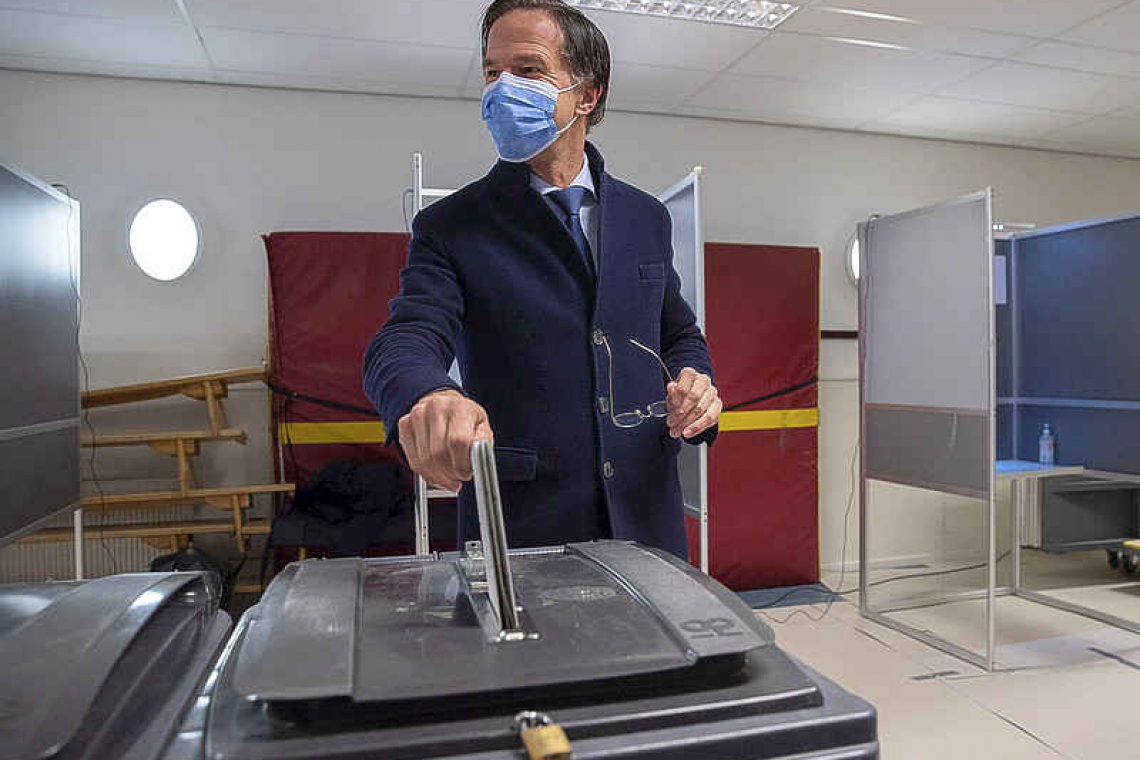 As final votes cast, Dutch PM expected  to stay in office after pandemic election