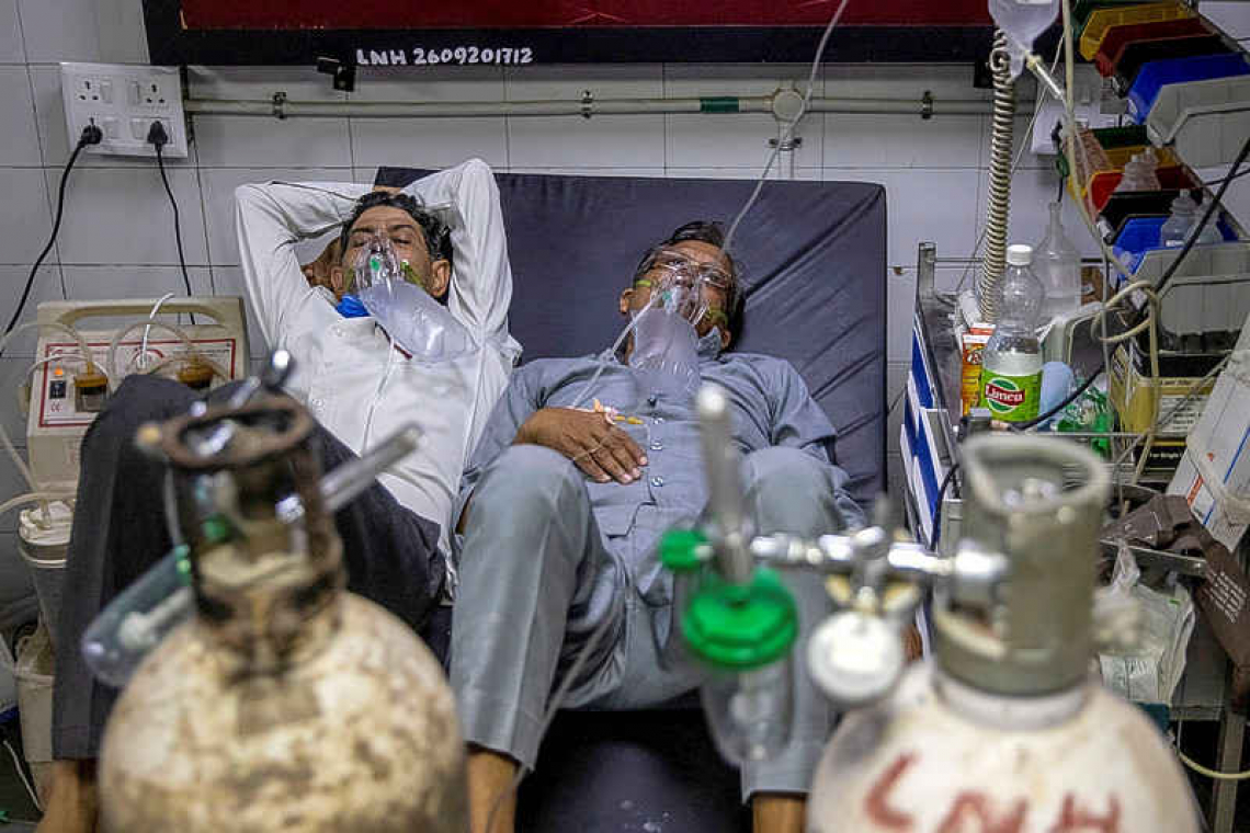 Indian hospitals overwhelmed by COVID surge, need beds, oxygen