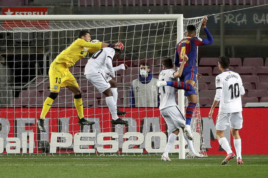    Messi double powers Barcelona to big 5-2 victory over Getafe