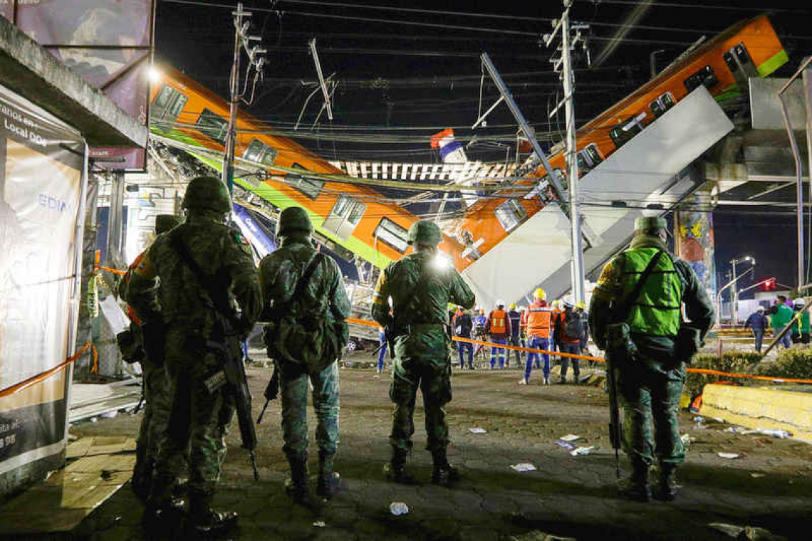 Mexico promises justice after metro train collapse kills 24