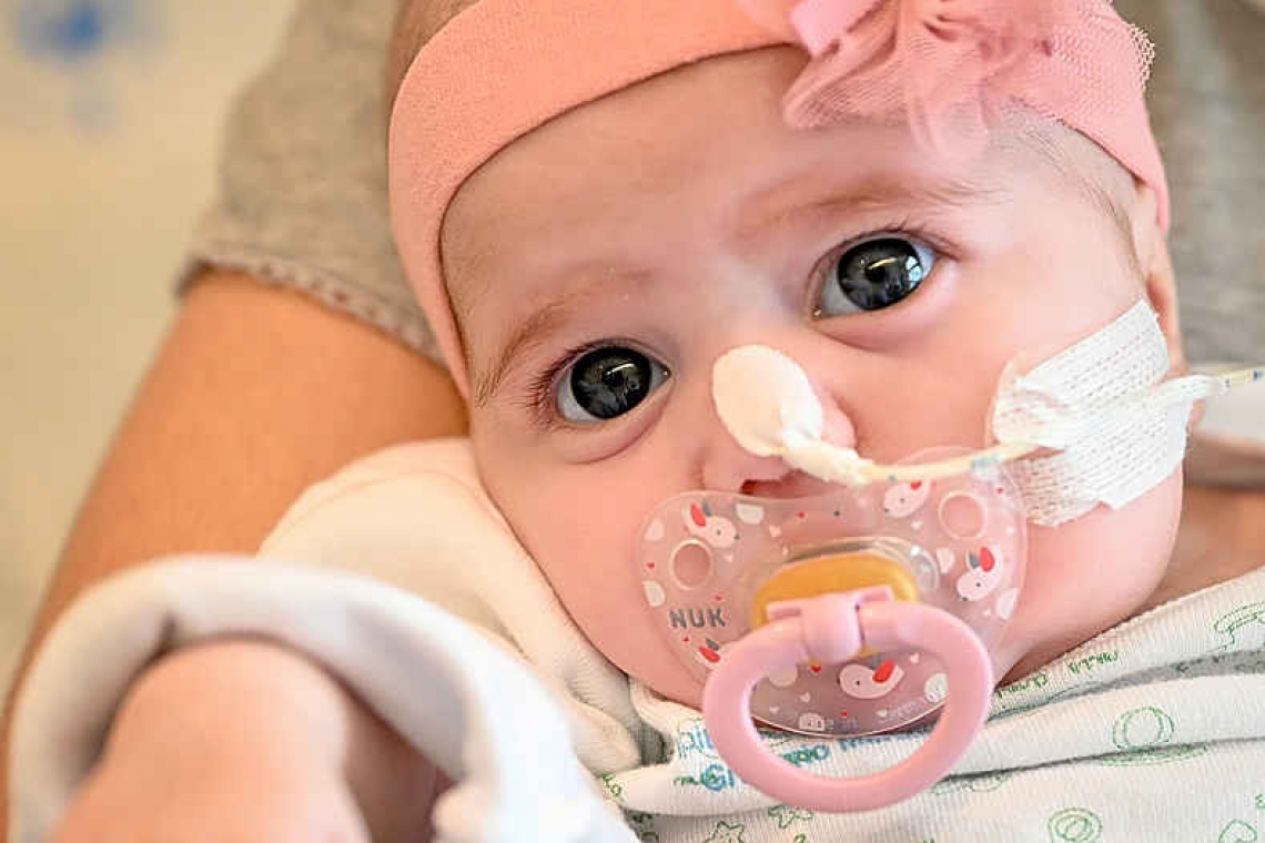 Two-month-old baby saved by pioneering heart transplant