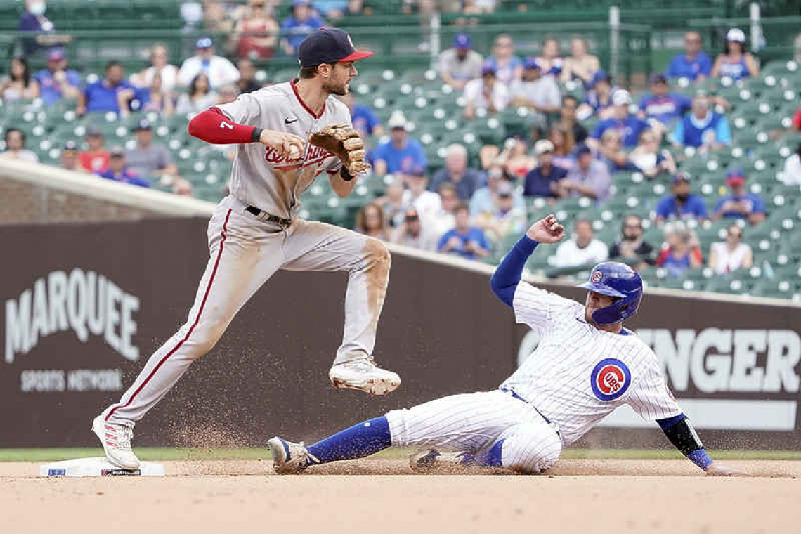    Ian Happ homers twice to lead Cubs past Nationals