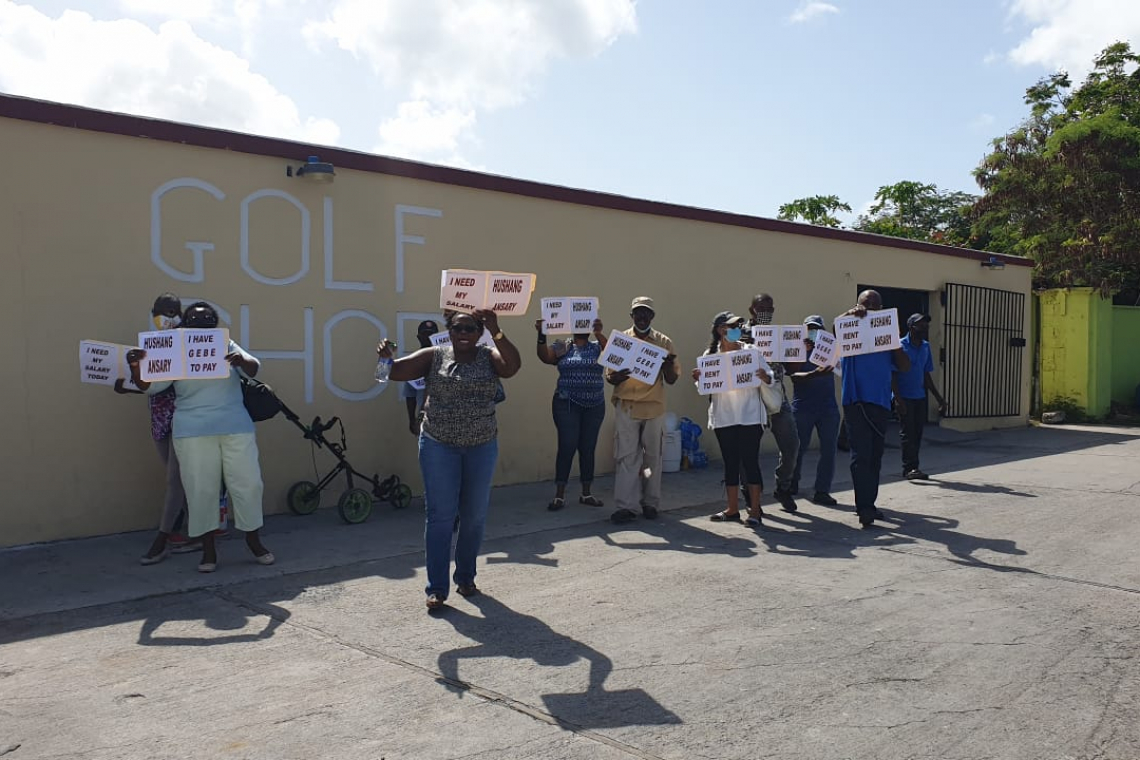 Fed-up workers at Mullet Bay  Towers demand their money