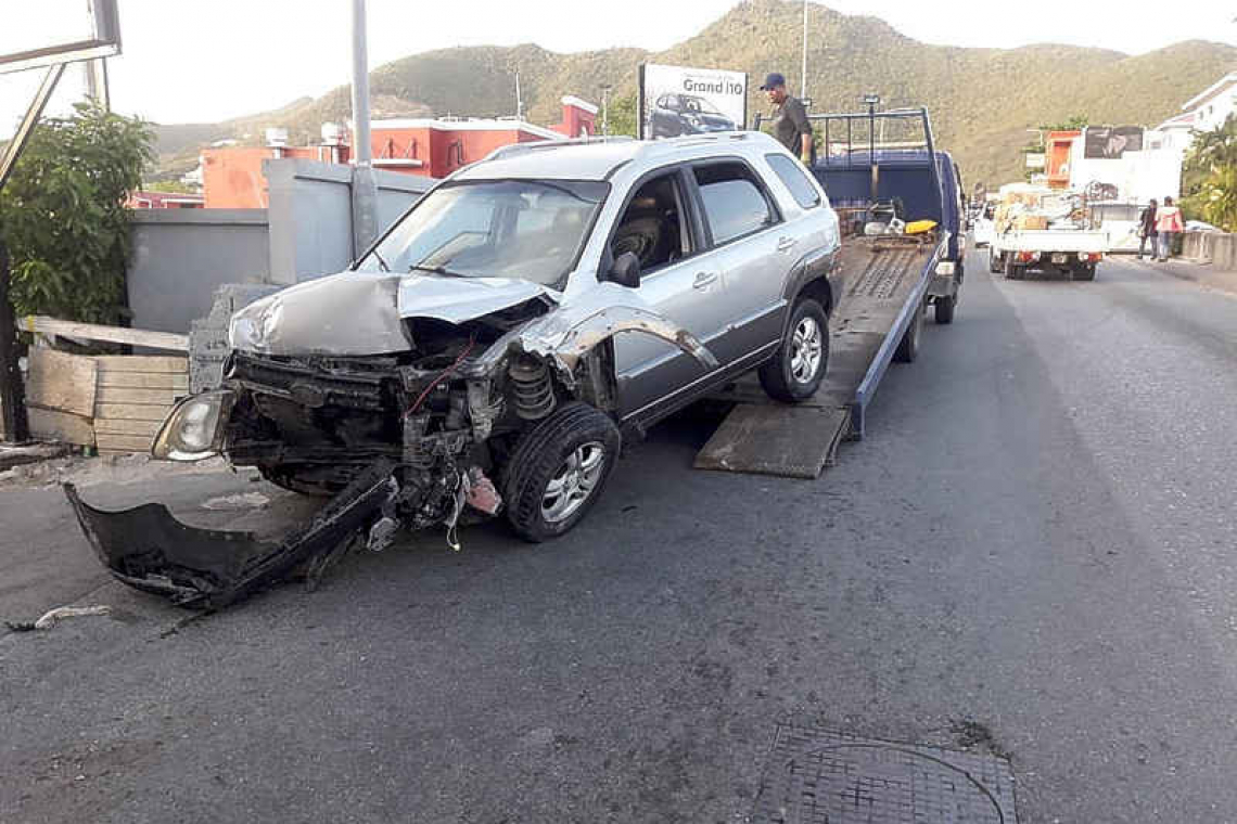 SUV overturns after losing  control, hitting other cars